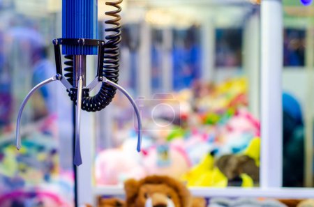 A claw crane game machine with toys