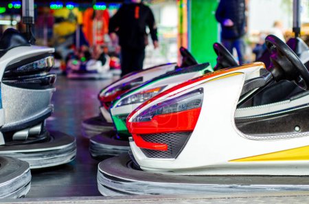 Photo for Close-up of bumper cars or dodgems. - Royalty Free Image