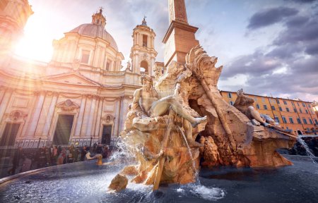 Téléchargez les photos : Rome. Italy. The Fountain of Four Rivers in Piazza Navona square. Ancient with sculptures during evening sunset. Famous touristic attraction - en image libre de droit