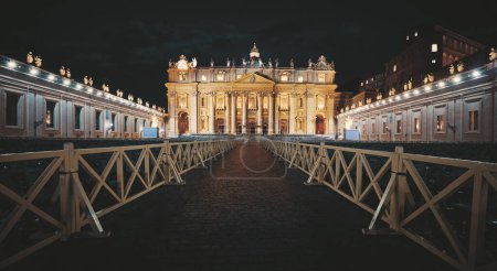 Photo for Vatican City (Holy See. Way to St. Peter's Basil cathedral on Saint Square. Nighttime, blue hour with night sky and street lamps illumination. Rome, Italy. Famous travel destination touristic landmark - Royalty Free Image