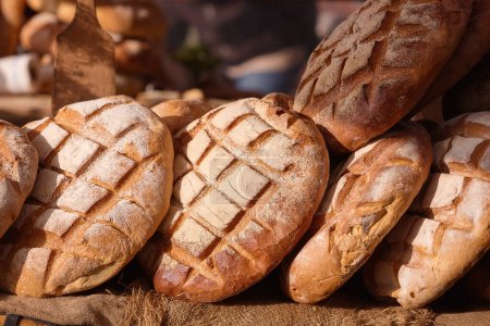 Photo for Bread. Fresh crispy crafting hand-made, fresh baked bread. Bakin - Royalty Free Image