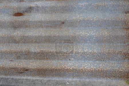 Foto de Background textued old zinc rust dirty roof at home - Imagen libre de derechos
