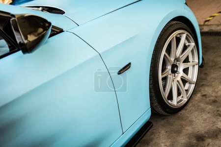 Photo for Tuned car rim detail of modern fast sports car. Exclusive tuned car disk close-up. Tuned disk on a sports car for drifting. Lowrider custom stance stylish sports car closeup. - Royalty Free Image