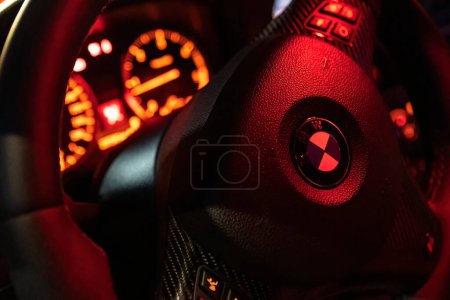 Photo for Milan, Italy 13 November 2022: Bmw steering wheel and dashboard detail in the dark night - Royalty Free Image