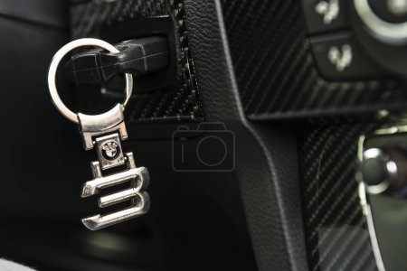 Photo for Milan, Italy 13 November 2022: Bmw 3 series evocative image with Keychain on the electronic key - Royalty Free Image