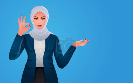 Téléchargez les photos : Belle femme d'affaires musulmane dans la mode hijab élégant présentant votre produit avec la fabrication et montrant ok signe de la main - en image libre de droit