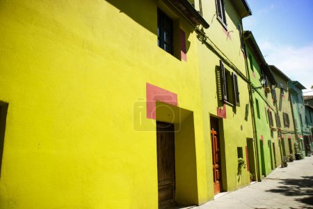 Photo for Photographic documentation of the colored houses in Ghizzano Pisa Italy - Royalty Free Image