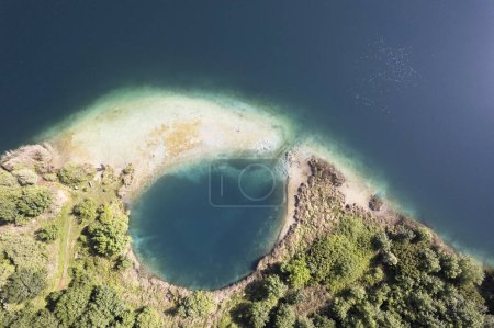 Photo for Aerial photographic documentation of the particular inlet of the Accesa lake Grosseto Italy - Royalty Free Image