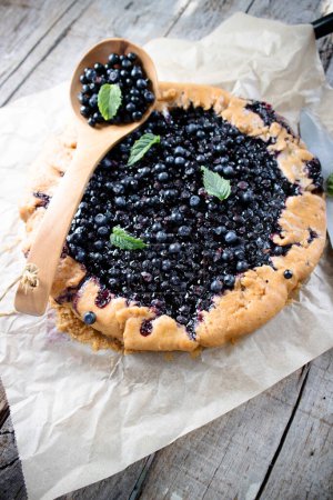 Photo for Photographic documentation of a rustic cake made with wild blueberries - Royalty Free Image