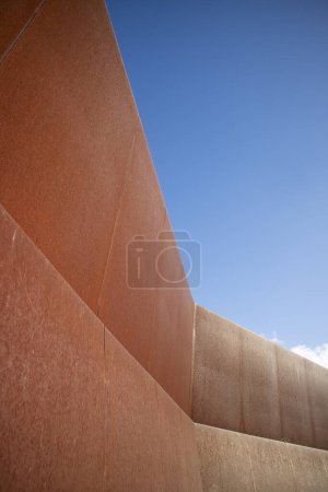 Photo for Photographic documentation of an iron protective wall thrown into the blue sky - Royalty Free Image