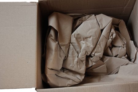 Photo for Cardboard box with paper - Royalty Free Image