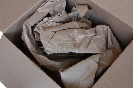 Photo for Cardboard box with paper - Royalty Free Image
