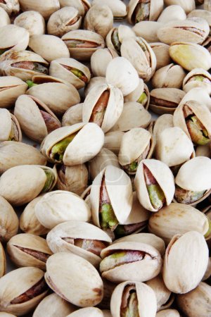 Photo for Pistachios nuts background. Pistachio is a healthy vegetarian protein nutritious food - Royalty Free Image