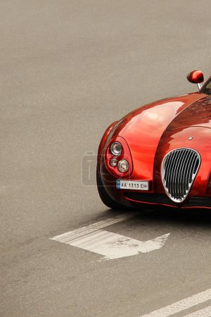 Photo for Kiev, Ukraine - June 12, 2021: Wiesmann GT MF4. Sports red exclusive car on the road - Royalty Free Image