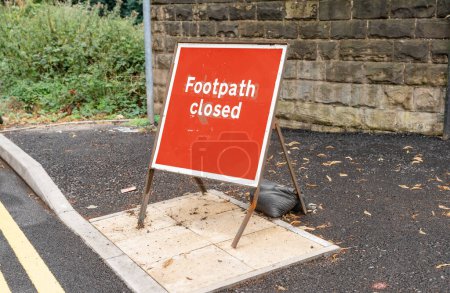 Photo for Footpath closed sign due to road repairs - Royalty Free Image