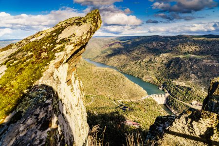 Photo for Mountain landscape and Douro river with spanish Saucelle Dam. Border between Portugal and Spain. National Park. View from portuguese Penedo Durao lookout. - Royalty Free Image