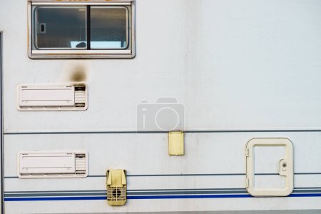 Photo for Camper car detail. Grid, fridge ventilation plate blackened by smoke. Gas problem. - Royalty Free Image