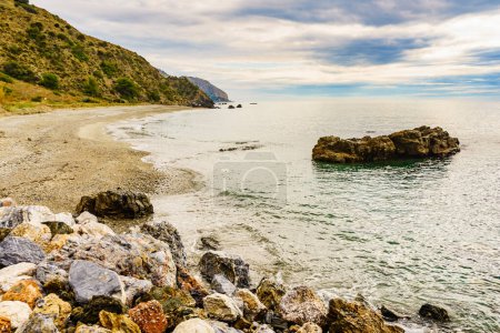 Coastal landscape in Andalusia. Cliffs of Maro Cerro Gordo Natural Park, near Maro and Nerja, Malaga province, Costa Del Sol, Spain.