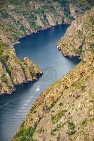 Photo for Boat trip on the Sil River. Sil Canyon in Ribeira Sacra, Galicia Spain. View from Balcon de Madrid lookout. Tourist attraction. - Royalty Free Image
