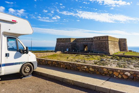 Caravan on coastal fortification, castle near the town of Los Banos de Guardias Viejas, Almeria province, Andalusia Spain. Tourist place.