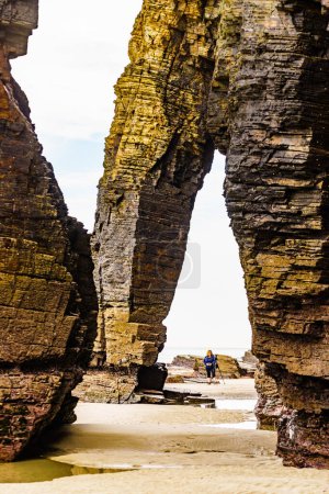 Beach of the Cathedrals, Playa las Catedrales in Ribadeo, province of Lugo, Galicia. Cliff formations on Cantabric coast in northern Spain. Tourist attraction.