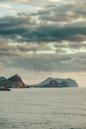 Spanish coastal landscpae with castle San Juan on cliff, Aguilas, Murcia region, Spain.