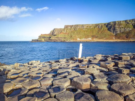 Photo for A few of the 40000 interlocking basalt columns at the Giants Causeway by Bushmills in Northern Ireland, United Kingdom. - Royalty Free Image