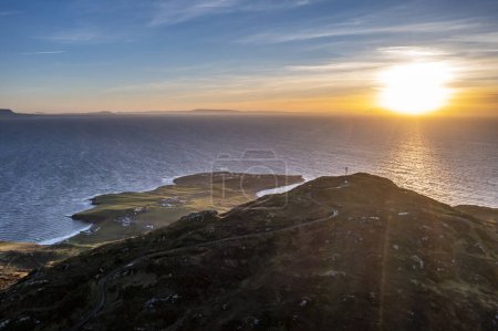 Foto de Beautiful sunset at Muckross Head peninsula about 10 km west of Killybegs village in county Donegal on the west coast of Ireland. - Imagen libre de derechos