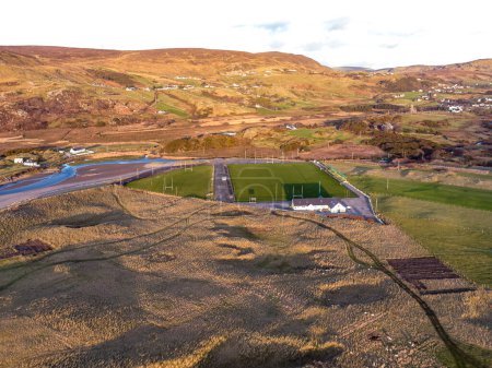 Photo for Aerial view of Glencolumbkille GAA field in County Donegal, Republic of Irleand. - Royalty Free Image