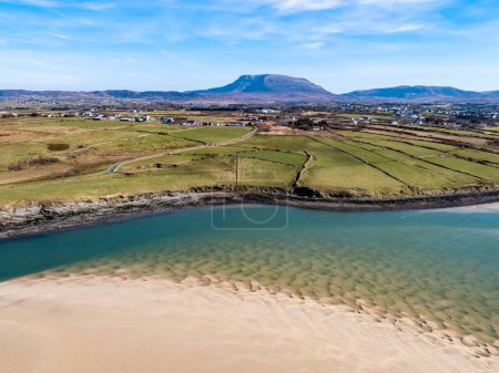 Photo for Aerial view of Ballyness Bay and Magheraroarty with the Muckish in the background in County Donegal - Ireland. - Royalty Free Image
