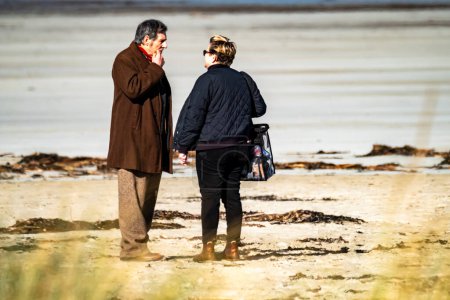 Photo for PORTNOO, COUNTY DONEGAL, IRELAND - MARCH 07 2023 : For Letters of Love is being filmed at the beach, starring Pierce Brosnan,Gabriel Byrne,Helena Bonham Carter, Fionn O Shea,Ann Skelly. - Royalty Free Image