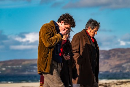 Photo for PORTNOO, COUNTY DONEGAL, IRELAND - MARCH 07 2023 : For Letters of Love is being filmed at the beach, starring Pierce Brosnan,Gabriel Byrne,Helena Bonham Carter, Fionn O Shea,Ann Skelly. - Royalty Free Image