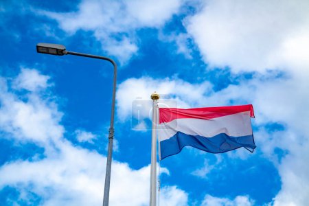 Photo for Flag of the Netherlands waving in the wind. - Royalty Free Image