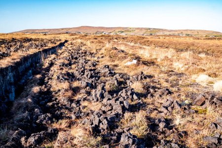 Photo for Peat Turf cutting in County Donegal - Ireland. - Royalty Free Image