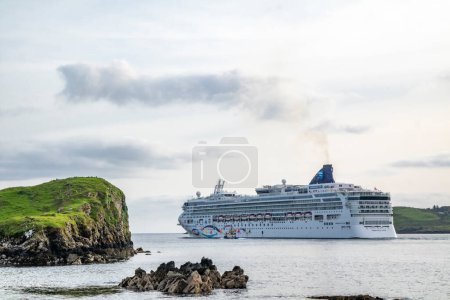 Photo for KILLYBEGS, IRELAND - MAY 16 2023: The Norwegian Star leaving after visiting Killybegs. - Royalty Free Image