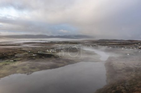Photo for Aerial view of Lough fad in the morning fog, County Donegal, Republic of Ireland. - Royalty Free Image