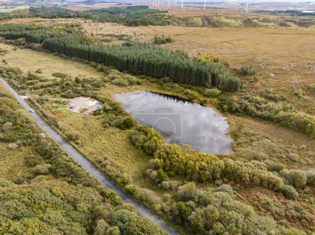 Photo for Aerial of lake in a peatbog by Clooney, Portnoo - County Donegal, Ireland - Royalty Free Image