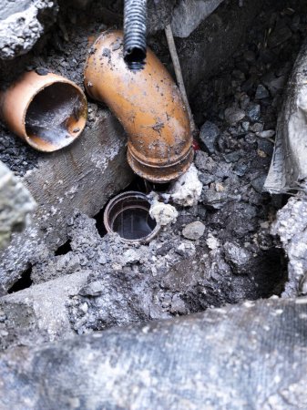 Photo for Broken pipes due to subsidence of building on a peatbog. - Royalty Free Image