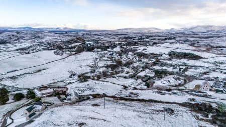 Photo for Aerial view of snow covered Bunaninver and Lackagh by Portnoo in County Donegal, Ireland - Royalty Free Image
