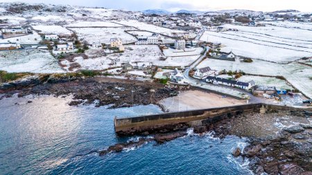 Aerial view of a snow covered Portnoo harbour in County Donegal, Ireland