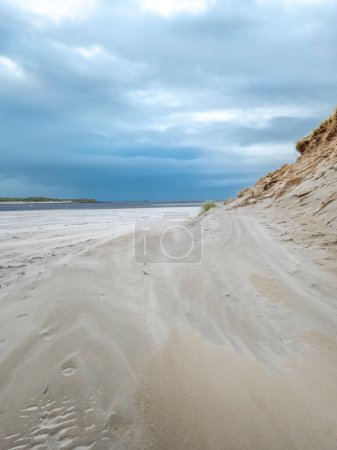 Sandsturm am Strand von Dooey bei Lettermacaward in der Grafschaft Donegal - Irland.