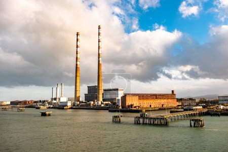 Photo for DUBLIN, IRELAND - MARCH 03 2019: Poolbeg power station in the harbour. - Royalty Free Image