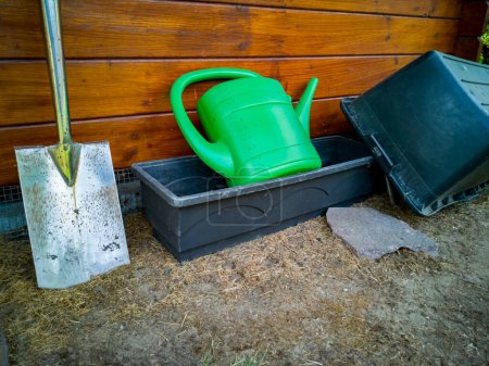 Photo for Gardening tools, watering can, shovel and pots. - Royalty Free Image