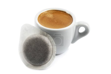 Photo for Cup of espresso and coffee pod on white background - Royalty Free Image