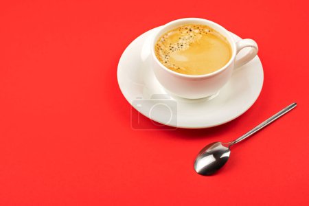 Photo for Cup of espresso on red background - Royalty Free Image