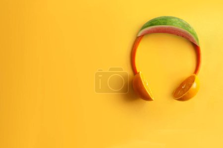 Photo for Headphones made from watermelon, summer music, festival, and playlist concept - Royalty Free Image