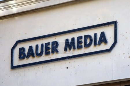 Photo for London, UK - January 15th 2024: Close-up of the Bauer Media logo on the exterior of a building in central London, UK. - Royalty Free Image