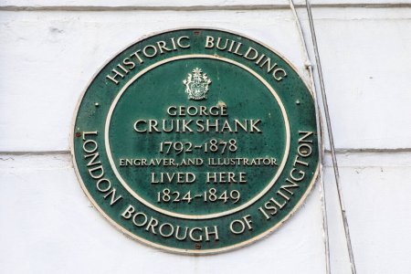 Foto de Londres, Reino Unido - 5 de febrero de 2024: Una placa en Amwell Street en Londres, Reino Unido, que marca el lugar donde vivió el grabador e ilustrador George Cruikshank. - Imagen libre de derechos