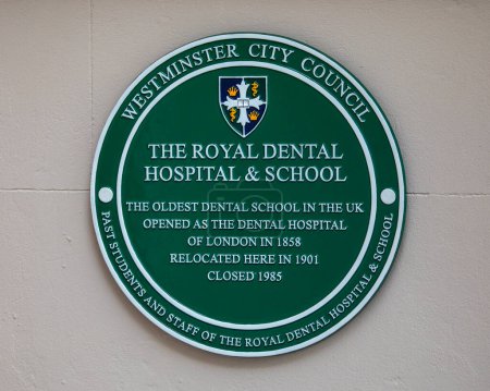Photo for London, UK - February 26th 2024: A green plaque in Leicester Square, London, marking the former location of The Royal Dental Hospital and School. - Royalty Free Image