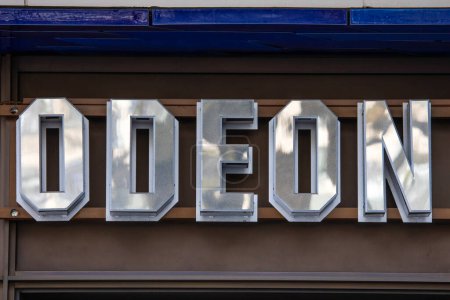 Téléchargez les photos : London, UK - February 26th 2024: Close-up of the Odeon logo on the exterior of an Odeon cinema in Leicester Square, London, UK. - en image libre de droit